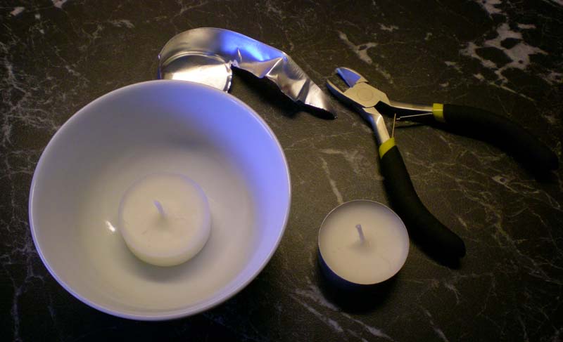 Ta bort aluminiumet från värmeljuset
